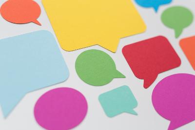 Different coloured speech bubbles on a white background